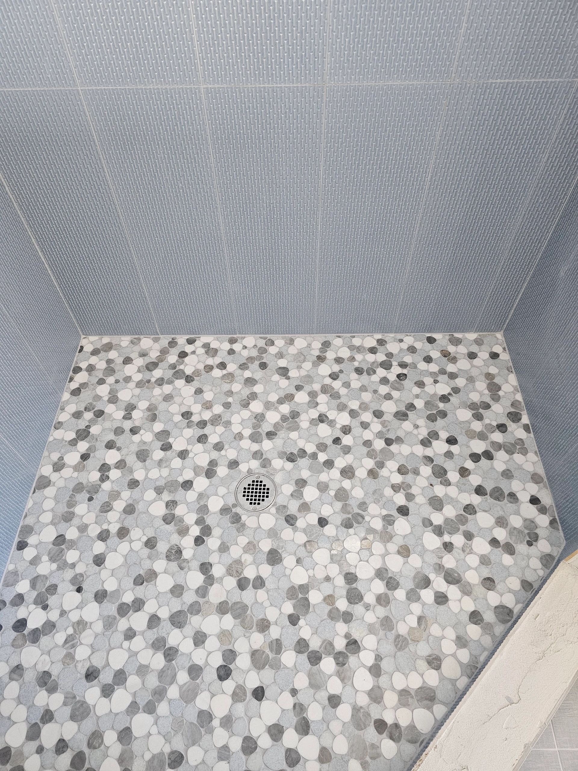 Bathroom with decorative tile accent